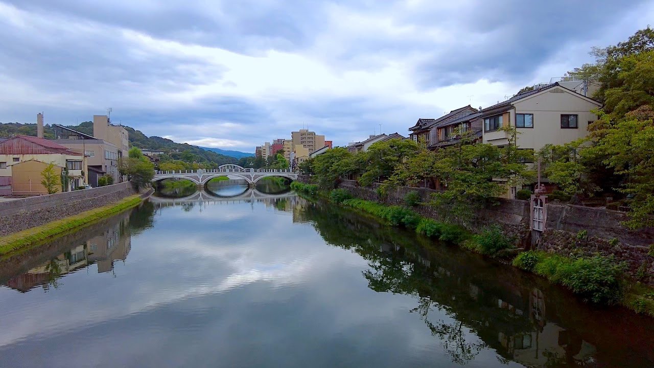 Immersive street-level walking tour through Kanazawa Higashi Chaya, Japan, showcasing authentic urban landscapes, local architecture, and the vibrant atmosphere of the city's neighborhoods