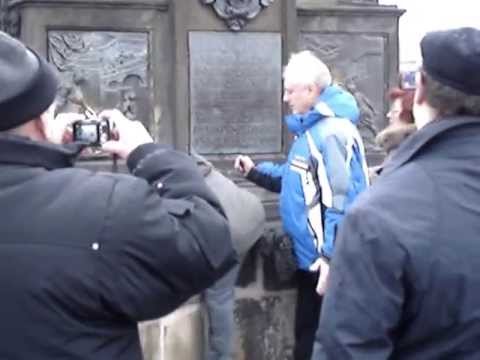 Statue of Saint John of Nepomuk on Charles Bridge in Prague.