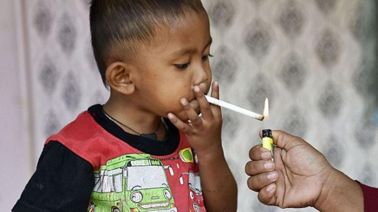 Watch video Toddler Chain-Smokes Through 2 Packs of Cigarettes a Day Now Toddler Chain-Smokes Through 2 Packs of Cigarettes a Day