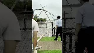 Traditional Giant Fishing Net in Action