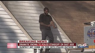 VIDEO: Man in police standoff dances on roof