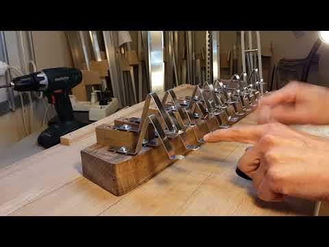 Marimbula (bass kalimba) with metal tines and tuned overtones