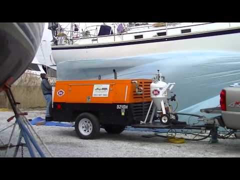 Part of a video titled Soda Blasting Boat Bottom at Old Bay Marina Baltimore - YouTube