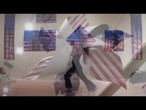 Saraha Michelle Black dancing to David Bowie's Afraid of Americans.