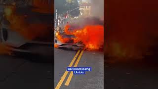 Cars burn during LA riots