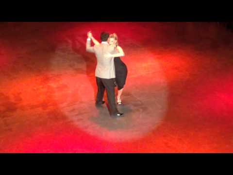  Mariana Montes  and  Sebastian Arce  are  dancing  to  the  tango  "  Romance de Barrio  "  by  Aníbal Troilo  at  International Tango Festival Karlsruhe  in  2014