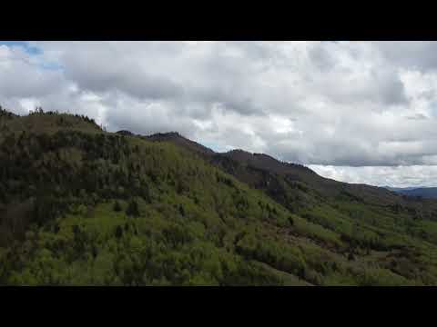 Aerial view // drone DJI Mini 2 // Tarcau Mountains // Romania //access from Ghimes Palanca pass