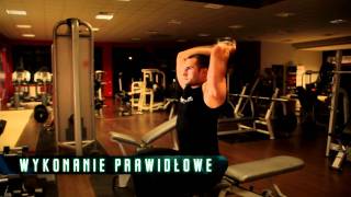 Wyciskanie francuskie z hantlem stojąc — wideo