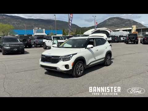 2025 Kia Seltos EX AWD in White for sale at Bannister Ford Penticton in Penticton, BC