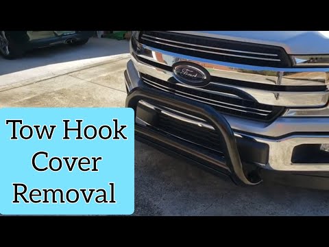 Tow hook cover removal