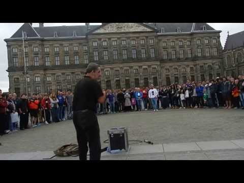 street performer in dam square,amsterdam