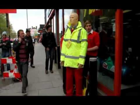 Living mannequin/robot performer being wheeled outside the machinemart shop in Wapping mannequin-man performming as a Living Mannequin: Living mannequin/robot performer being wheeled outside the machinemart shop in Wapping during the London Marathon on a sack trolley, then pranking people by suddenly coming alive. for Machine Mart on 22/04/2012