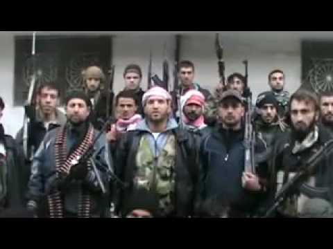 بيان يلقيه النقيب إياد الديك يتحدث عن العمليات العسكرية التي خاضها لواء خالد بن الوليد في مدينة الرستن