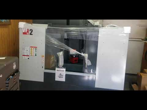 Moving the Haas VF2 a few feet over the day after it arrived.