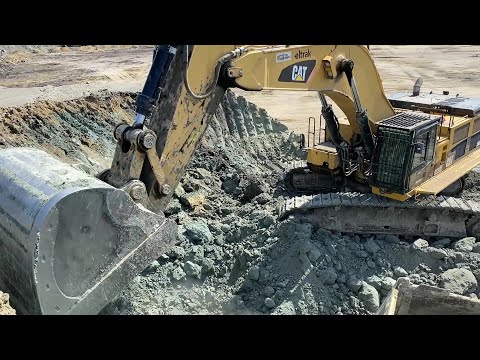 Caterpillar 390D Excavator Loading Mercedes & MAN Trucks - Interkat SA