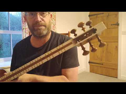 An Iranian Tar. An explanation for banjo players.