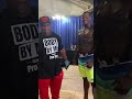 Pro Tan: Dexter Jackson tanning a competitor at NPC Nationals.