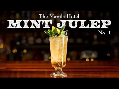 This Mint Julep from the 1920s is garnished with mint, pineapple, cherries and RUM!