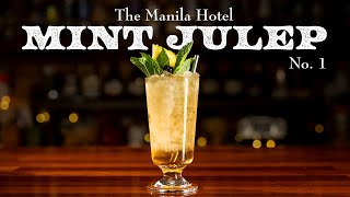 This Mint Julep from the 1920s is garnished with mint, pineapple, cherries and RUM!