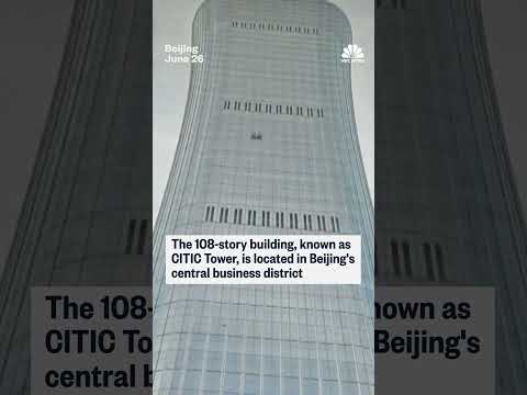 Small aircraft crashed into Beijing's tallest building, eyewitnesses say