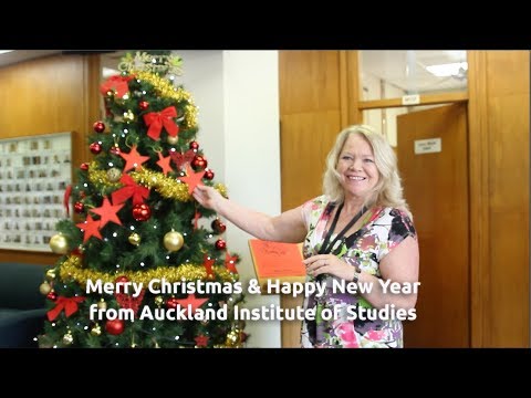 MERRY CHRISTMAS FROM AIS - AIS PRESIDENT - DR JULIA HENESSY AND STUDENTS