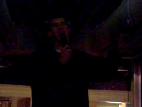 Lawrence singing We Will Rock You