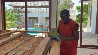 Building in Zanzibar island working on plastering the floor and sliding doors #building #zanzibar