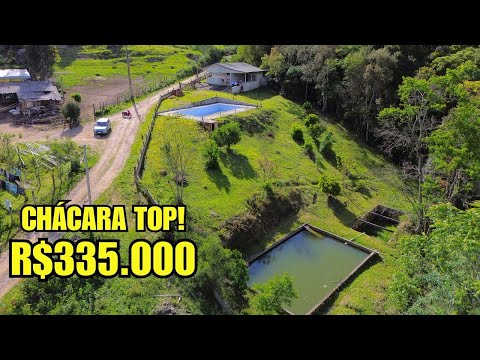 CHÁCARA COM PISCINA, TANQUE E NASCENTE E CASA NOVA– TIJUCAS DO SUL