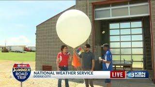 KSN Chief Meteorologist Lisa Teachman launches weather balloon at Dodge City National Weather Servic