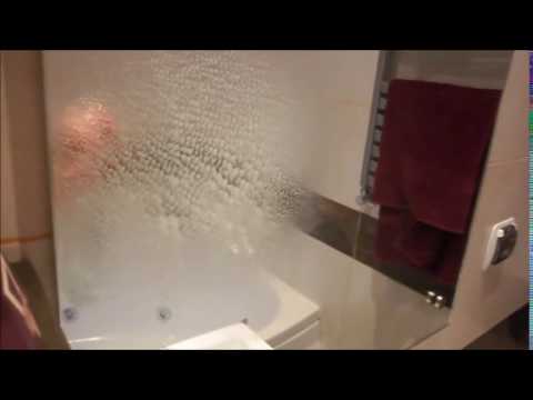 Spraying Windex