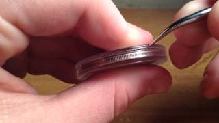 How to open air tight seals on coin cases!