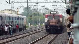 preview picture of video 'WAP-7 watches as BHEL WAG-7 freight overtakes WAP-4E Avadh Exp at 100Kmph!!'