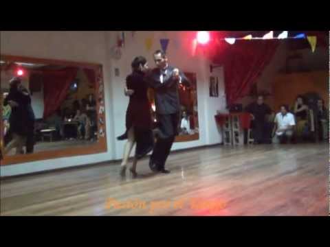  Ivan Inofre  and  Paola Correa  are  dancing  to  the  tango  "  Llorar Por Una Mujer  "  by  Sexteto Milonguero