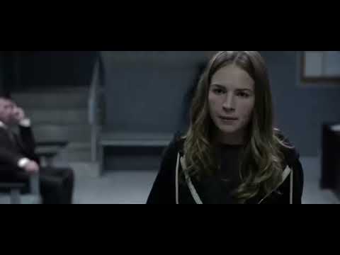 Trailer end-card: bright ‘T’ pin over city spires as the main theme lifts into credits