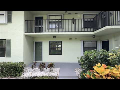 Modern 2-Bedroom First-Floor Residence with Peaceful Lake Views property video