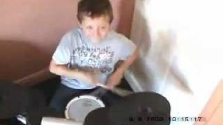 Conor Fletcher age 7 playing mustang sally by  the black rino band.wmv