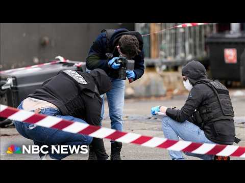 Suspect in custody after one person killed and four injured in shooting outside Paris 