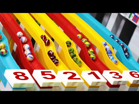 Carreras de Canicas - Campeonato entre 16 pelotas y rampas con puntos