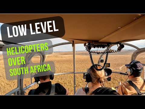 Low level helicopter flying over South Africa.