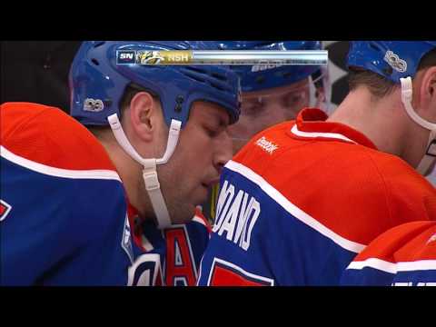 Lucic lays huge hit, draws penalty, then scores game-tying goal