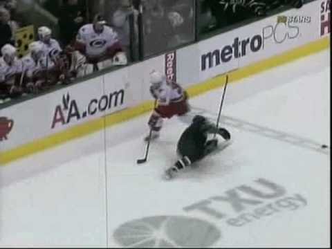 Jussi Jokinen hipchecks Matti Niskanen and Andrew Raycroft ROBS Joe Corvo