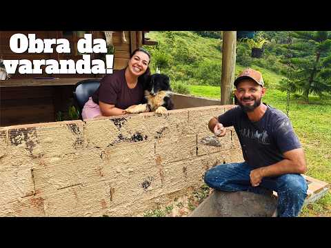 Answering questions and applying paint. Balcony work!