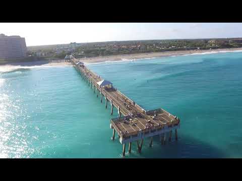 Aerial footage of surfers at Juno Beach