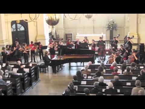 Penzance Youth String Orchestra play Ben Comeau's 'Jazz Patchwork for Piano and Strings'.