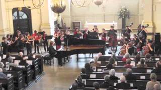 Penzance Youth String Orchestra play Ben Comeau's 'Jazz Patchwork for Piano and Strings'.