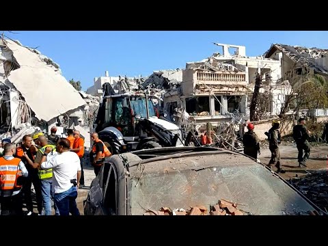 First responders on site of Iranian missile strike in central Israel | AFP