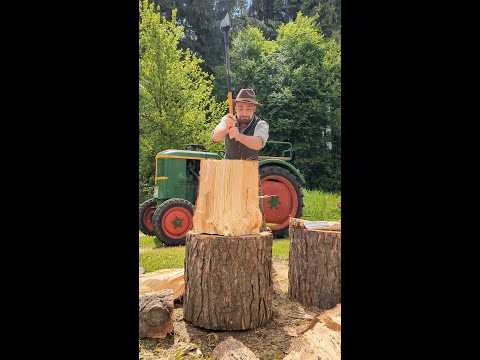 Fiskars IsoCore XXL meets knotted pine wood and Lederhosn #axe #woodworking