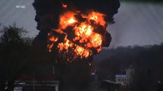 Crews release toxic chemicals from derailed tankers in Ohio