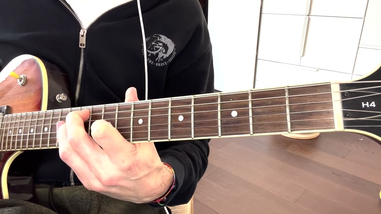 Roberto Barlocci playing minor triads on the G, D and A strings on electric guitar