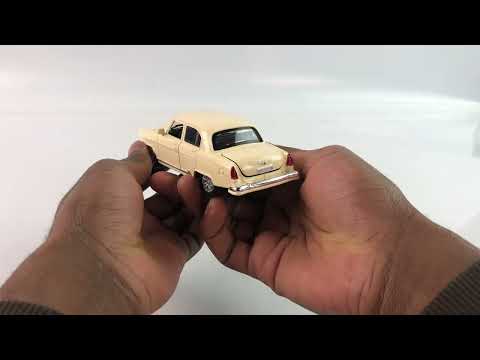 Машинка металлическая Danliao 1:32 «GAZ-21» 1812D, инерционная, свет, звук / Микс